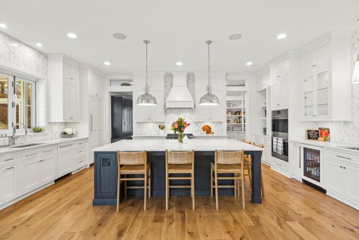 designer carpet in living room with luxury hardwood flooring 